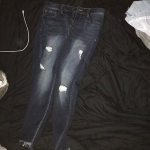 Mid rise ripped dark denim jeans